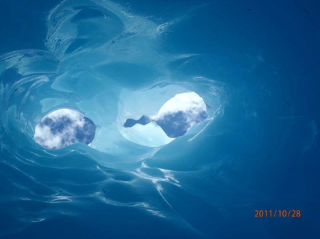 Fox Glacier - luchtschacht in ijstunnel