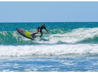 Nieuw-Zeeland - Sup-surfing  Whangamata